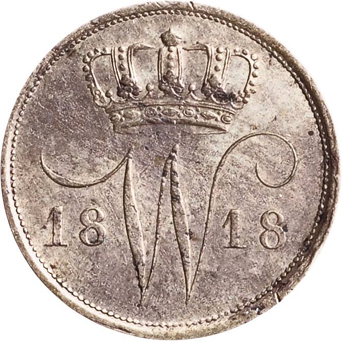 Een Nederlands 10ct muntje ook wel dubbeltje genoemd daterende uit het jaar 1818